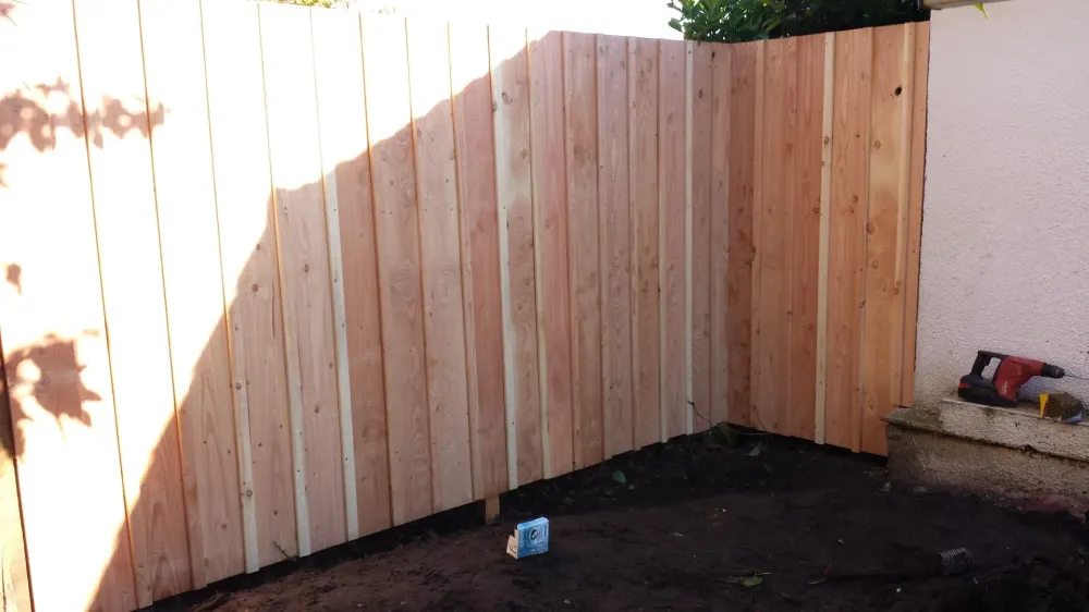 cloture bois volige couvre joint